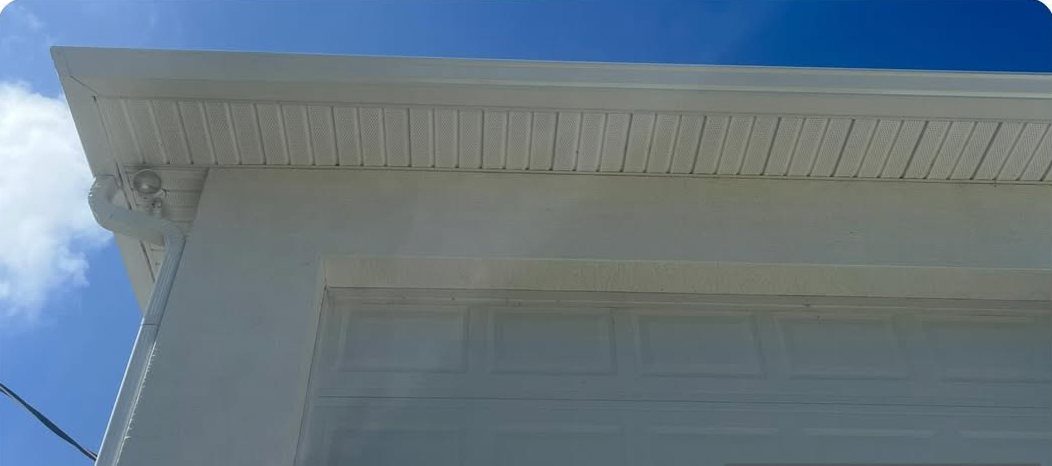 The same soffit and fascia cleaned back to bright white